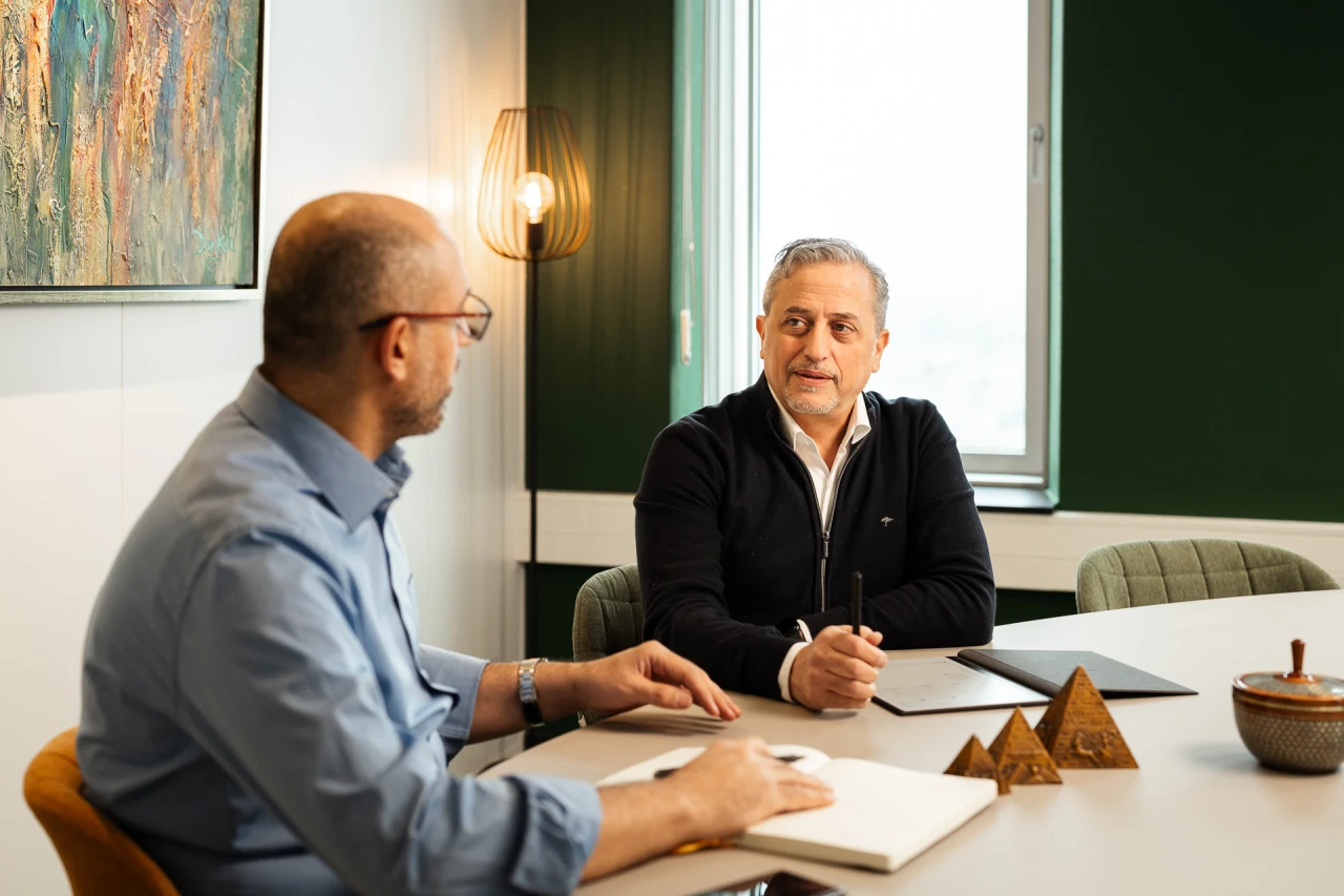 2-men-signing.webp